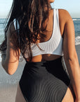 white and black reversible cut out one piece swimsuit