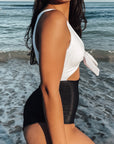 white and black cut out flattering one piece swimwear