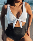 white and black cut out adjustable one piece