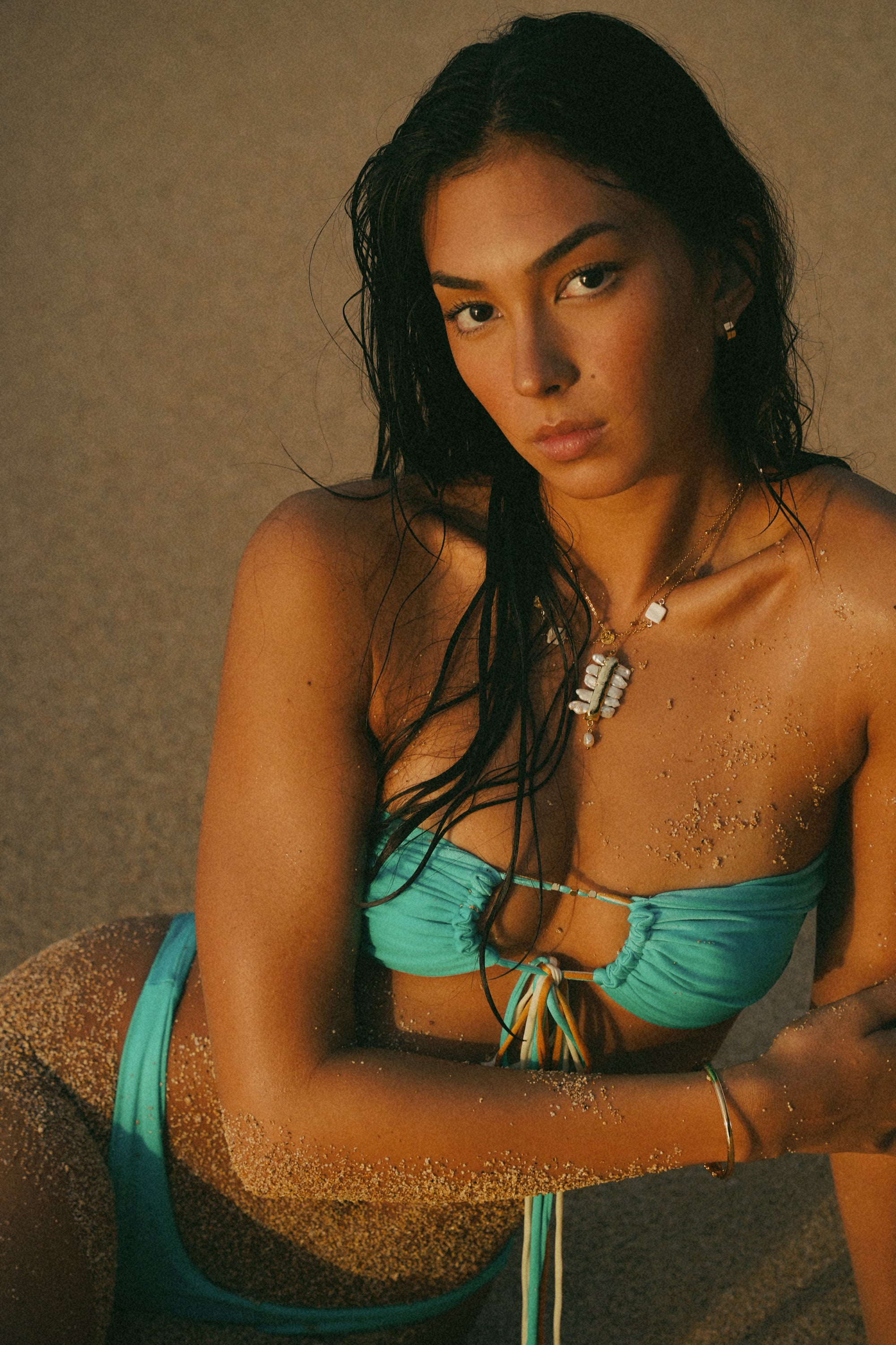 multi-way bikini top with gold beads and multicolored strings 