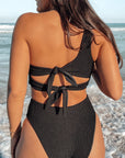 Supportive one shoulder adjustable textured black swimsuit