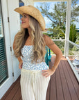 blue and white strapless one piece outfit